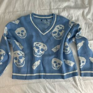 Blue skull sweater size medium